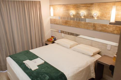 Ein Zimmer in der Unterkunft Hotel Imperatriz Premium