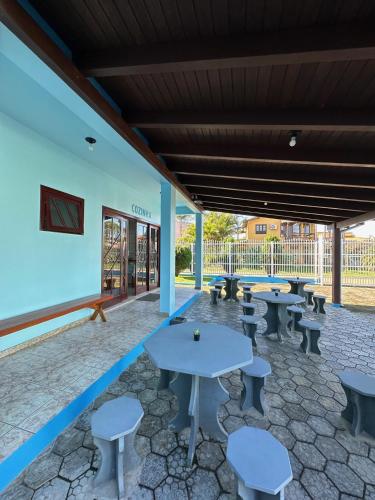 En restaurant eller et andet spisested på Pousada Solar de Anita Ferrugem