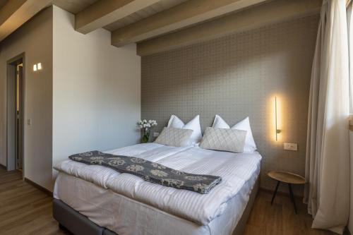 Postel nebo postele na pokoji v ubytování Casa Fontana, Luxury Rooms and Suite