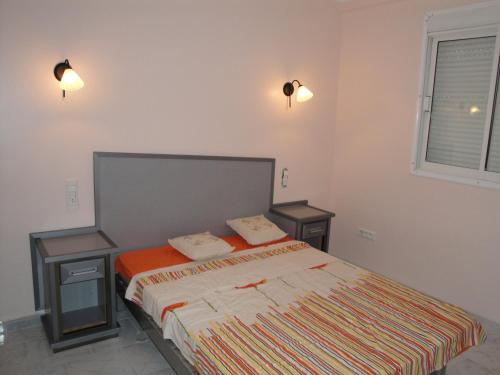 En eller flere senge i et værelse på Bel Appartement