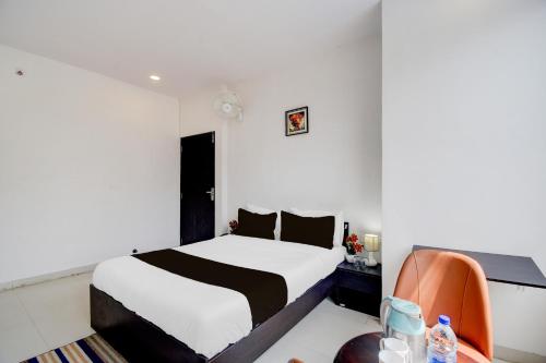Katil atau katil-katil dalam bilik di Hotel O Madhav Residency