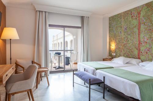 Katil atau katil-katil dalam bilik di Hotel Duque de Najera