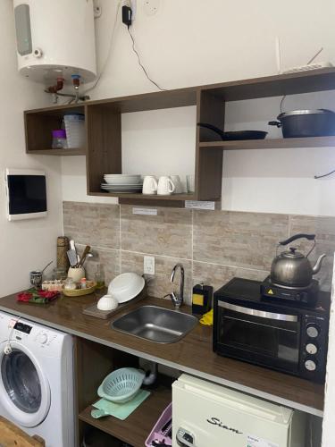 Kuchyň nebo kuchyňský kout v ubytování Wawa Estudio