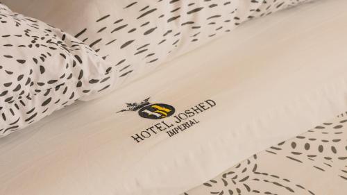 Hotel Joshed Imperialにあるベッド