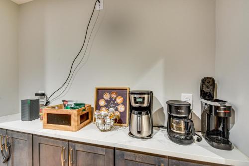 a kitchen counter with a coffee maker and a box at Waterfront Home on Lake Hartwell with Dock Access in Reed Creek
