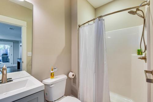 a bathroom with a toilet and a sink and a shower at Waterfront Home on Lake Hartwell with Dock Access in Reed Creek