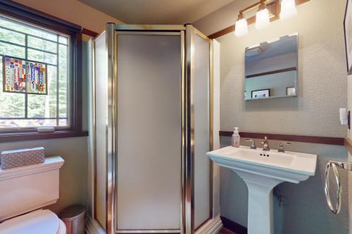 a bathroom with a shower and a sink at The Frank Lloyd Wright Home @ Deep Creek, MD in Bittinger