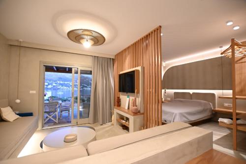 Katil atau katil-katil dalam bilik di Pefki Luxury Suites