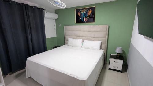 Ένα ή περισσότερα κρεβάτια σε δωμάτιο στο Hotel Yamir