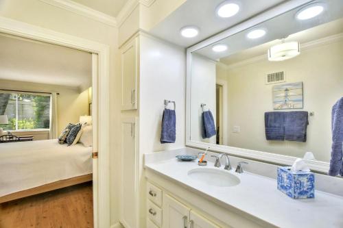 a bathroom with a sink and a mirror at Stepless in St. Simons in Ebo Landing