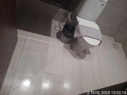 an overhead view of a bathroom with a toilet at Sulina Hlels 4 in Ho Chi Minh City