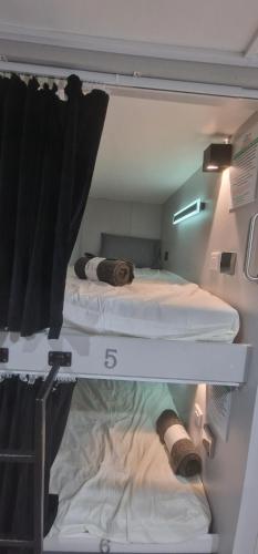 a room with two bunk beds in a room at Double bedroom studios in Dublin