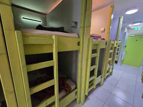 a group of bunk beds in a room at KGT House in Dublin
