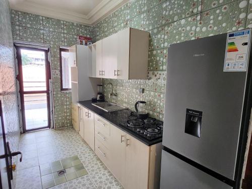 Una cocina o cocineta en Dream's HOME appartements meublés à Yaoundé, Bastos