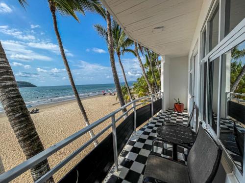 a balcony of a house with a view of the beach at Vacacional Luna Mar in Rincon de Guayabitos