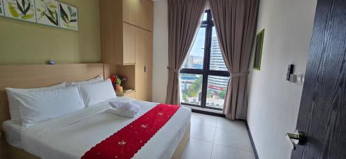 Katil atau katil-katil dalam bilik di Neu suite, Family Unit - Jelatek LRT Gleneagles Hospital