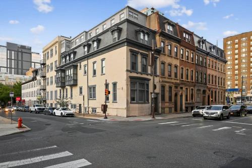 a city street with cars parked on the side of a building at Perfect Cozy Studio in Center City with Fast WiFi in Philadelphia