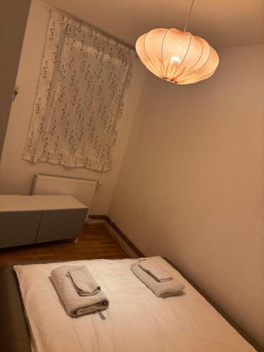 Ένα ή περισσότερα κρεβάτια σε δωμάτιο στο Tia Apartment