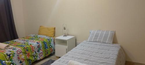 Llit o llits en una habitació de Fabulous Flat 2
