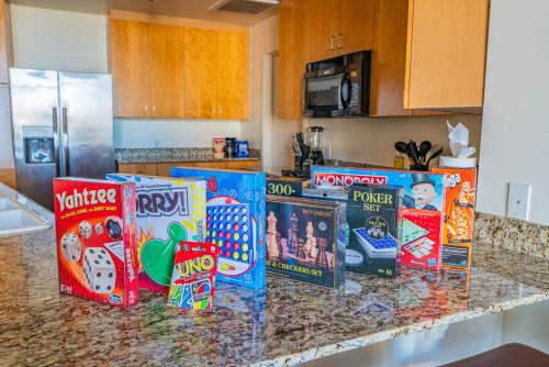 a kitchen counter with many cereal boxes on it at Tranquil 1BR with Parking Gym Pool in Phoenix