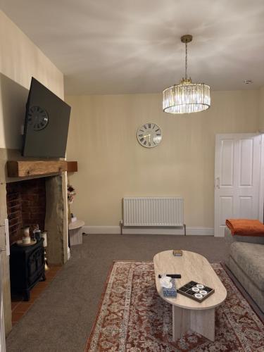 TV a/nebo společenská místnost v ubytování Deluxe Inn - Felling