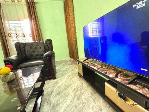 Zona de estar de Charming apartment in Yaoundé - Nkolmesseng