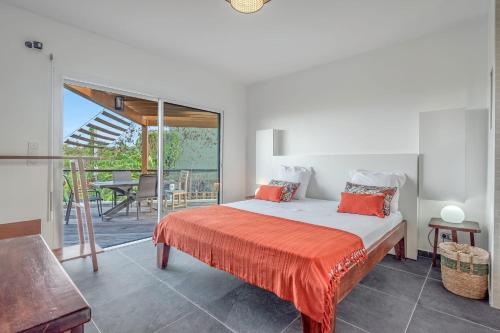 Appartement Canne Rougeにあるベッド