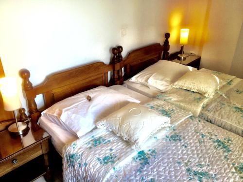 a bedroom with two beds with pillows on them at Irene Villa in Ierápetra