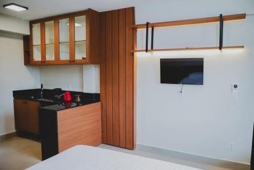 Dapur atau dapur kecil di Loft completo e climatizado a 2 minutos do centro