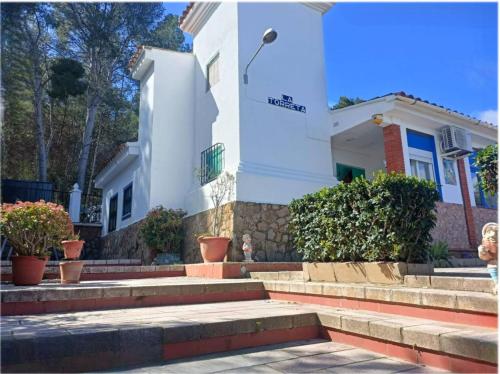 Gallery image of Bedroom with private bathroom One Bedroom Family Suite in forest with good view 80m2 large swimming pool in music city Lliria The garden and swimmingpool and garden are shared in Lliria