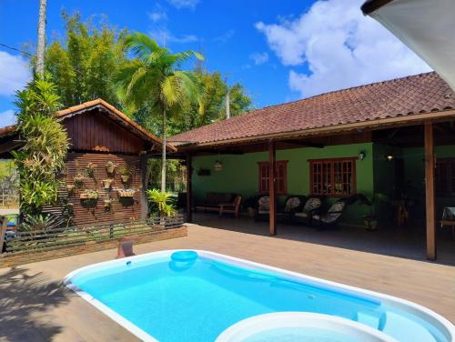 Hồ bơi trong/gần Casa Aconchegante em São Pedro da Serra