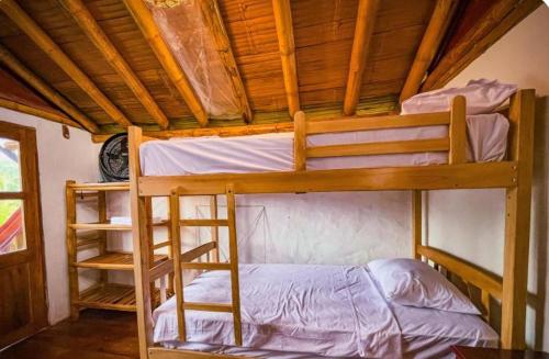 Palms Oasis Montañitaにあるベッド