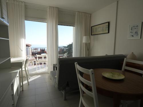 Quiet Studio in Fenals with Balcony, Pool and Workspace for Medium-Term Rental