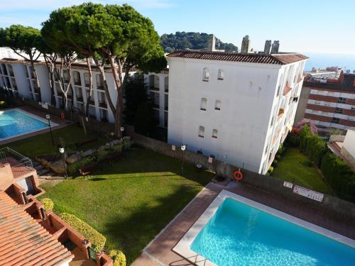 Quiet Studio in Fenals with Balcony, Pool and Workspace for Medium-Term Rental