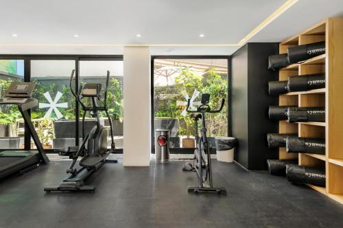 a gym with two exercise bikes in a room at Colima 340 by Wynwood House in Mexico City
