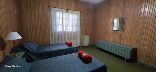 Ένα ή περισσότερα κρεβάτια σε δωμάτιο στο Casa Camelia san nicolas