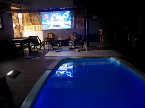 Swimmingpoolen hos eller tæt på Temporada Capuba Jacaraípe ES