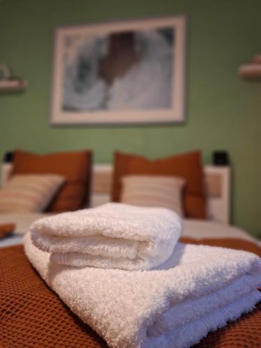 Katil atau katil-katil dalam bilik di Ferienhaus Ninua, 2 Schlafzimmer, Garten Terrasse