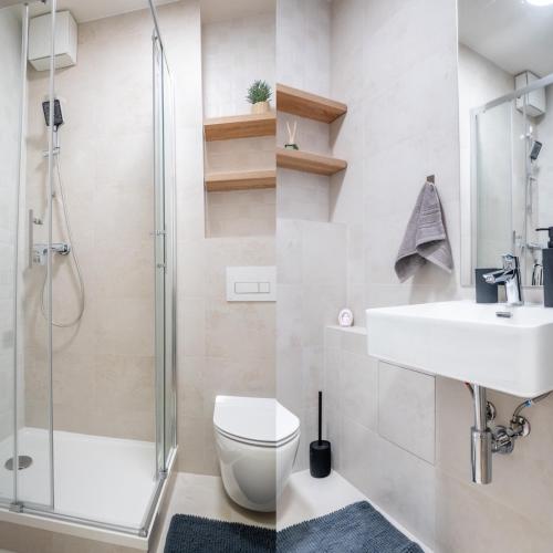 a bathroom with a shower and a sink and a toilet at Luxapartment l Krivá in Košice