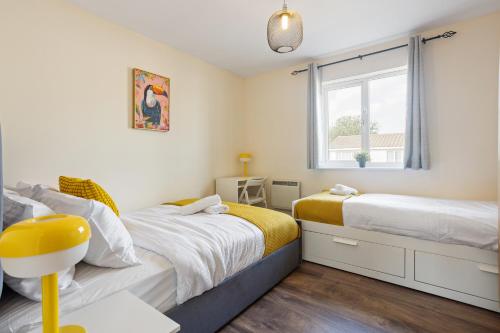 Ένα ή περισσότερα κρεβάτια σε δωμάτιο στο 2-bed -Free parking- Excel - Canning Town- Canary Wharf