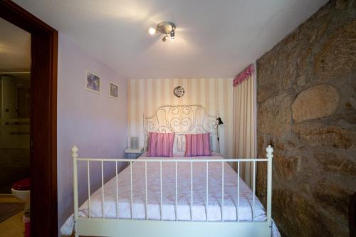 Postel nebo postele na pokoji v ubytování Casa Amarela