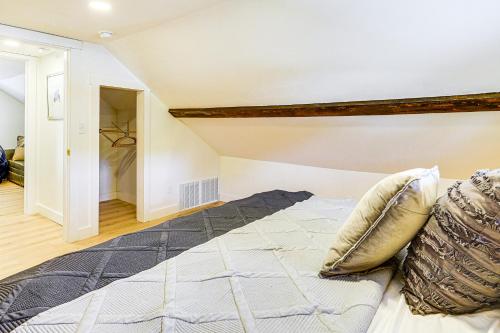 a bedroom with a large bed in a attic at 17 Mi to Sundance Mtn Home with Shared Yard in Midway