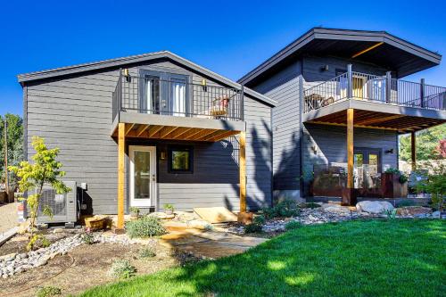 a house with two balconies on top of it at 17 Mi to Sundance Mtn Home with Shared Yard in Midway