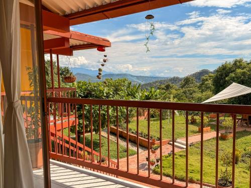 a balcony with a view of the mountains at El Nido Andino in La Mesa