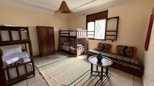 Postel nebo postele na pokoji v ubytování Emallayan Hostel