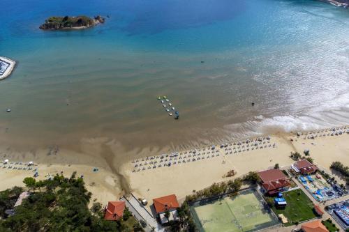 an overhead view of a beach with a group of people at Apartments and rooms with parking space Lopar, Rab - 19238 in Lopar