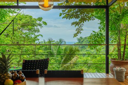 a room with a view of the jungle at The Green House, Santa Teresa - Adults Only in Santa Teresa Beach