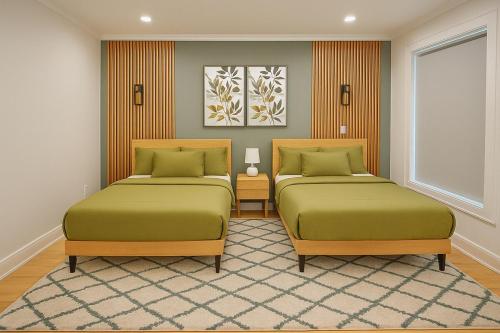 two beds sitting in a room with at Modern Home 3BR 2BA - 20 Min to NYC in Jersey City