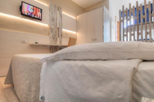 Postel nebo postele na pokoji v ubytování Hotel Franz