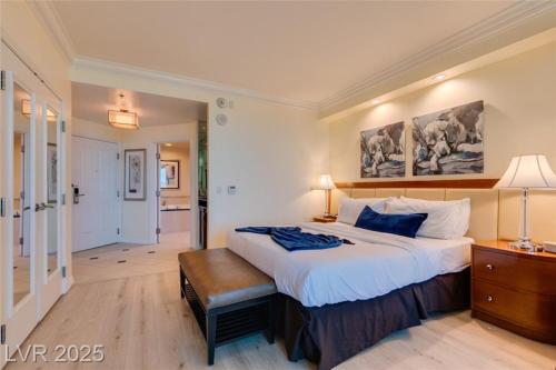 Postel nebo postele na pokoji v ubytování New Mgm Signature Condo